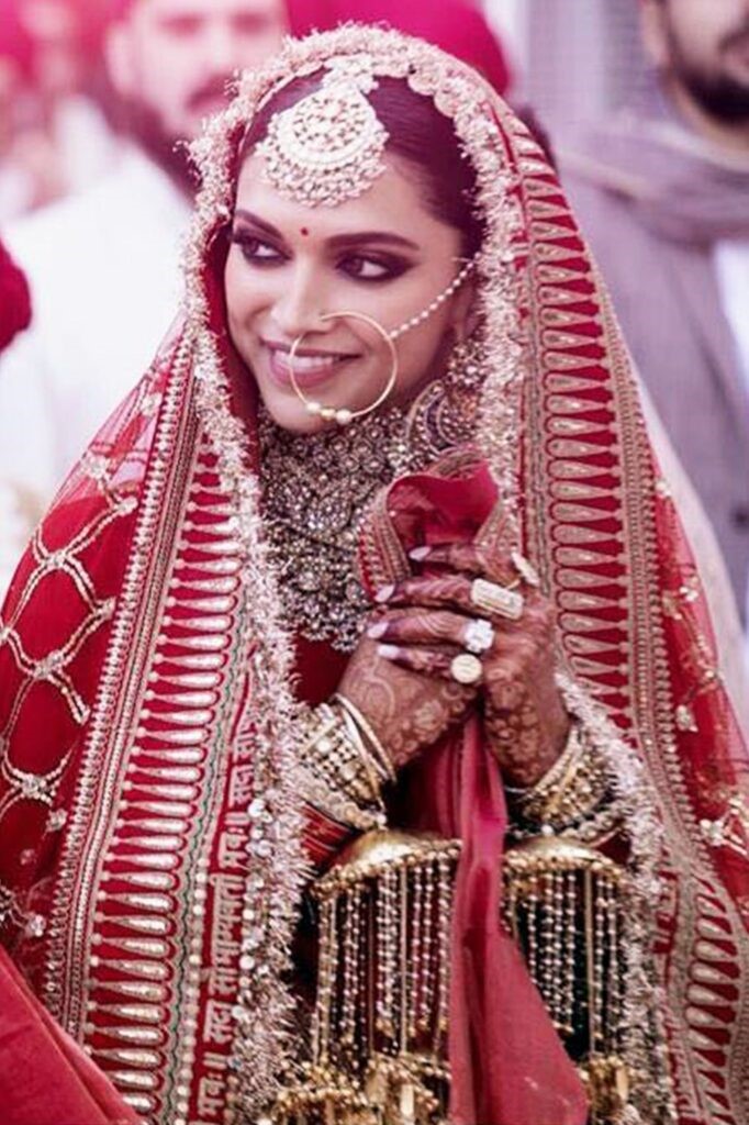 Shruti - A classic red bridal lehenga, exquisite jewellery... | Facebook