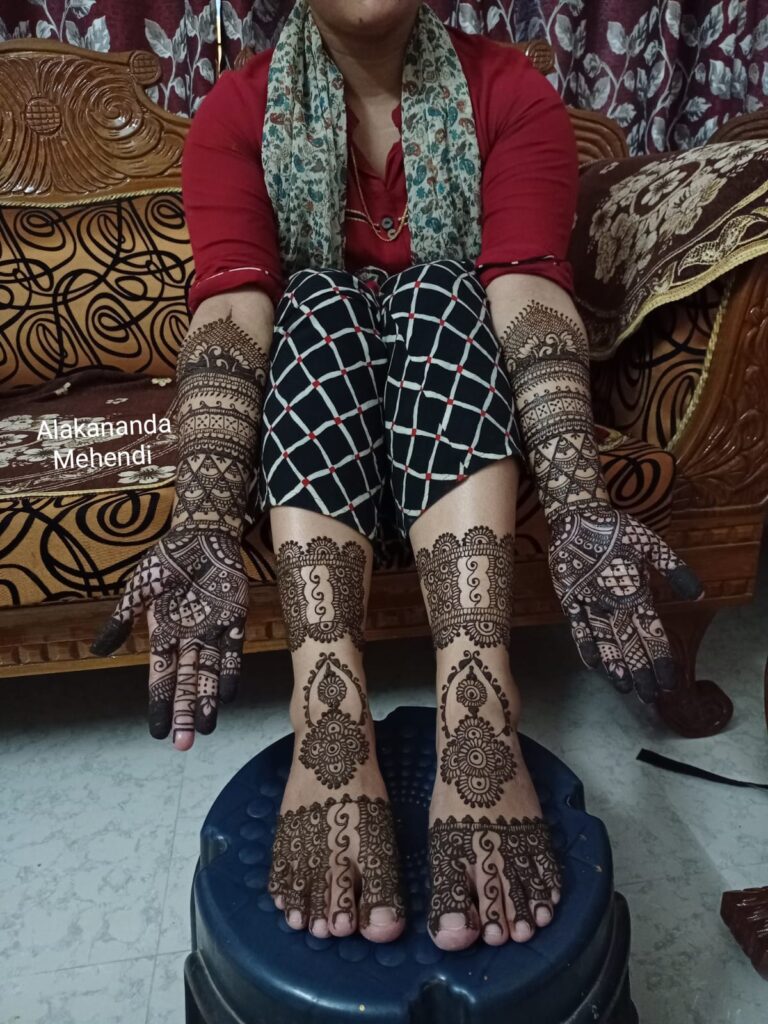 Mehndi design for hands and feet.