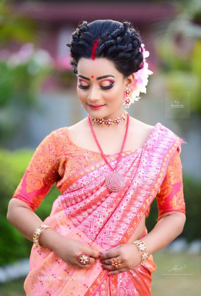 Assamese girl with a enhanced makeup look.