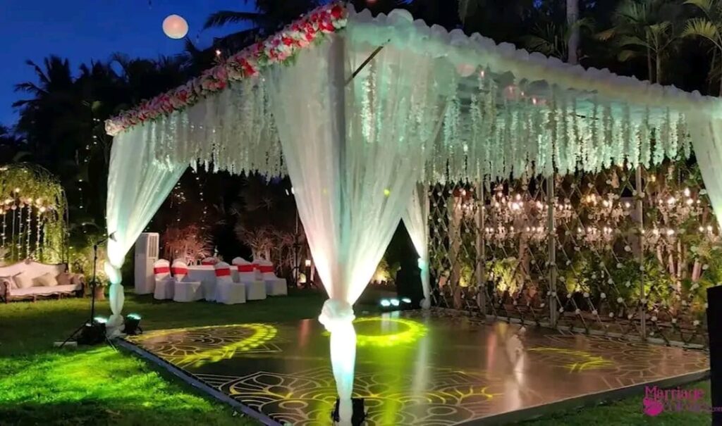Dance floor decorated with flowers and lights