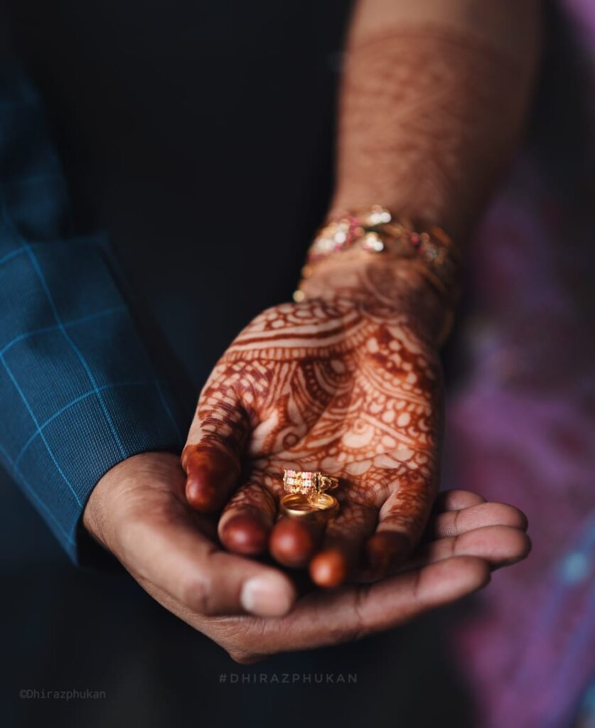 A ring placed on the hands of the bride and groom.