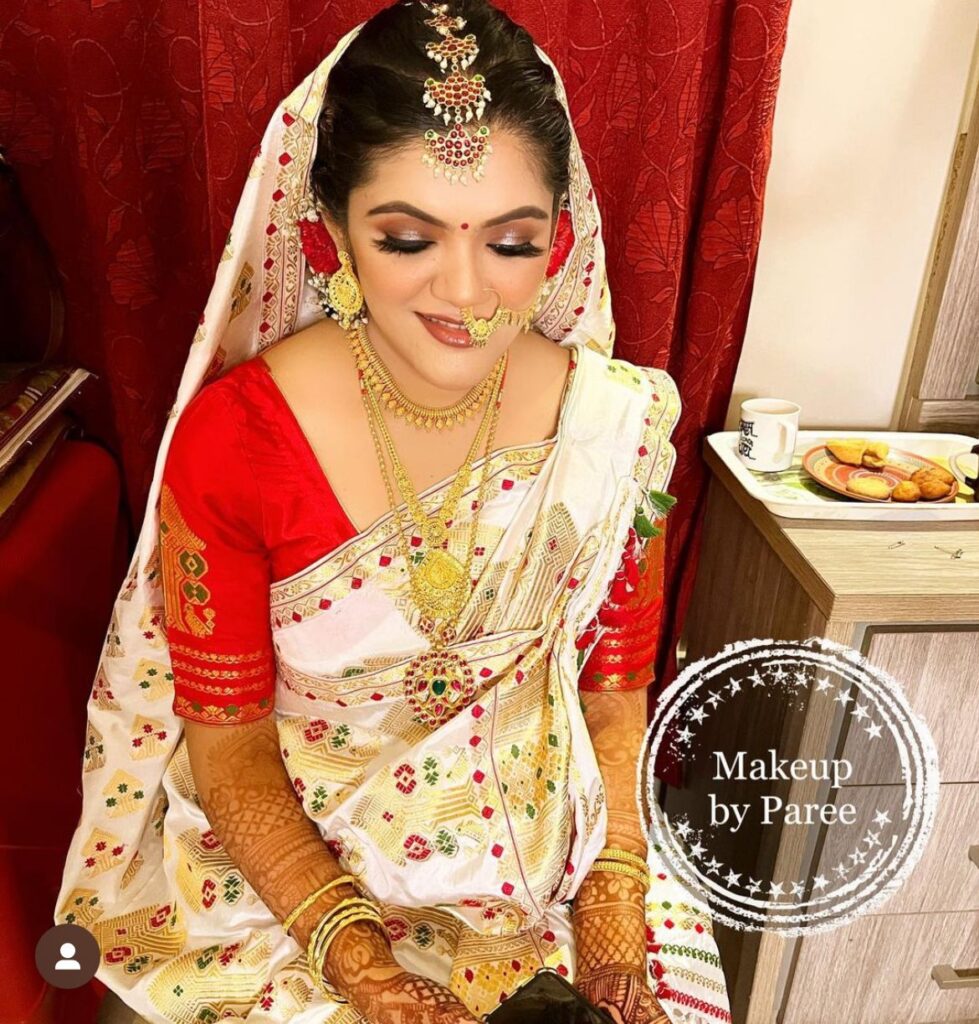 Bride's makeup done by Paree Kalita.