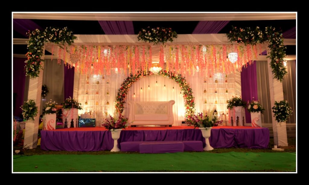 Stage decorated with flowers and lights