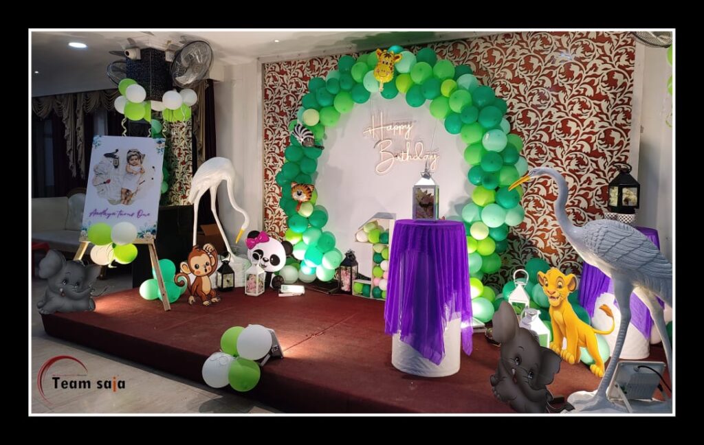 Birthday decoration with green balloons