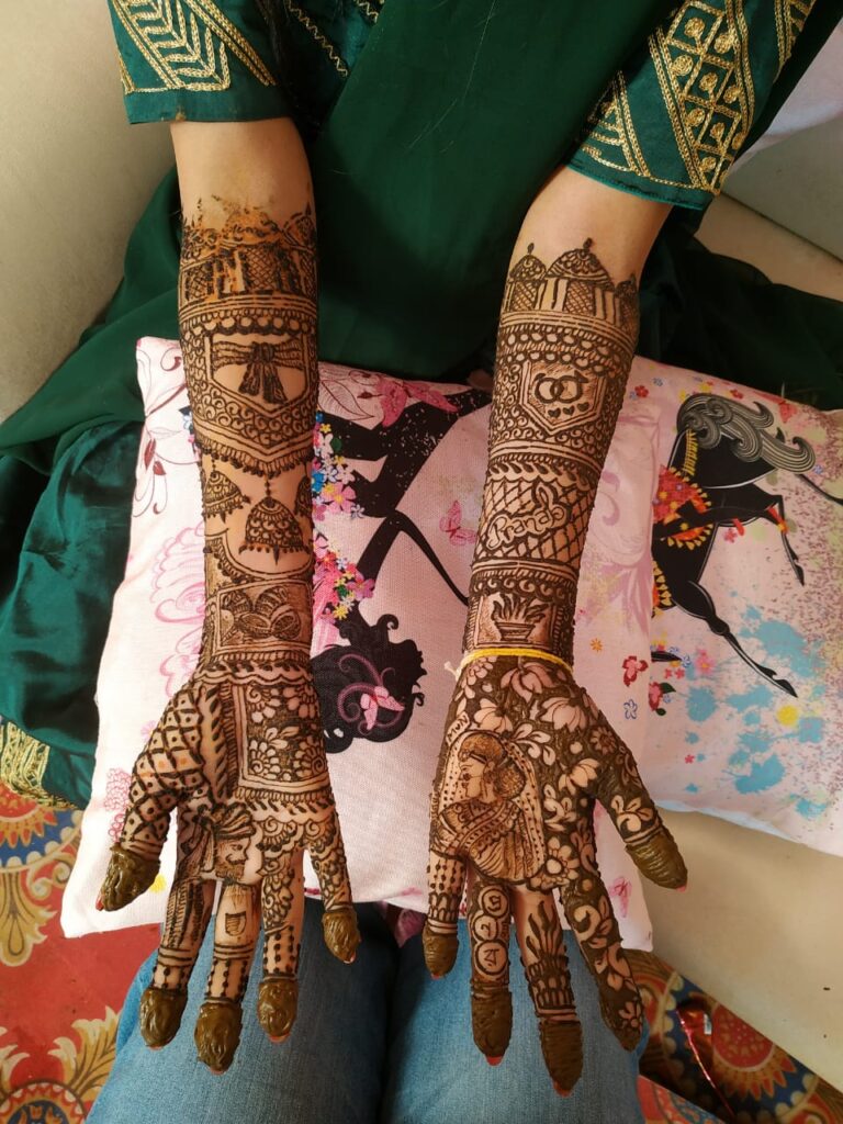 Mehndi design for full hands.