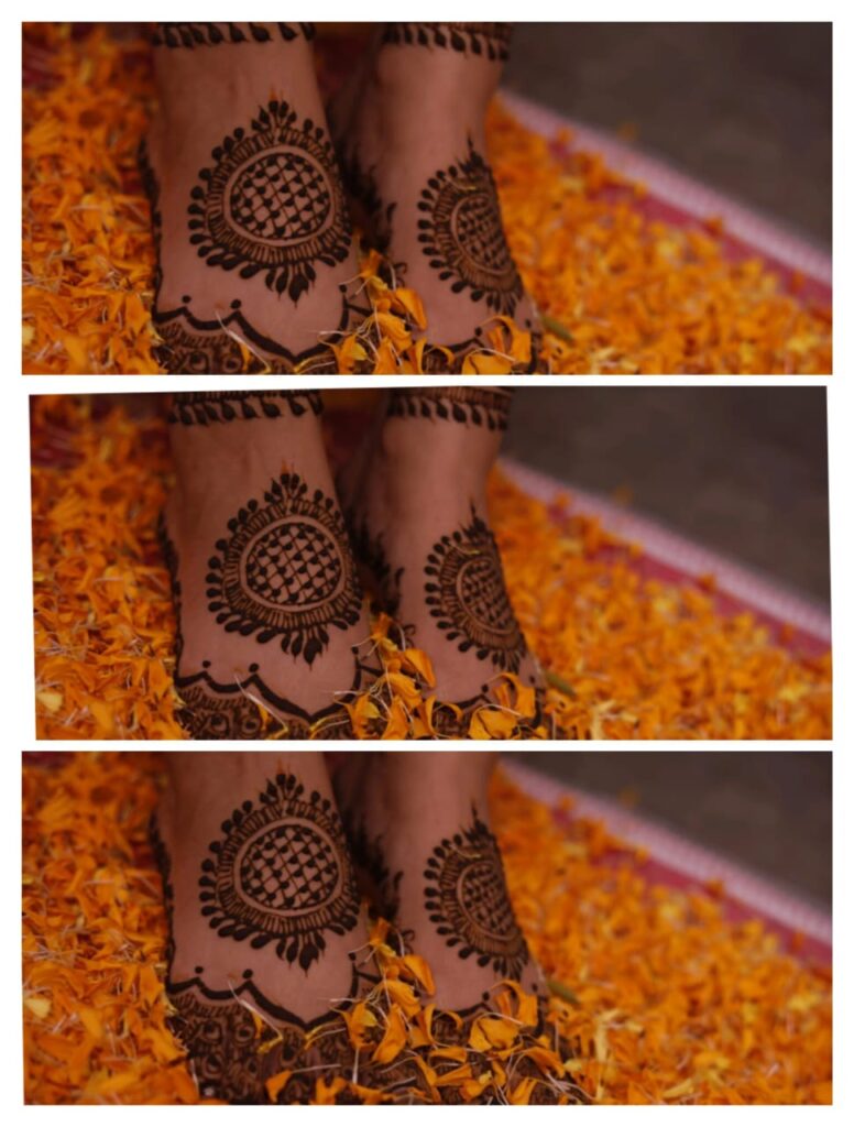 Henna designs applied on feet.