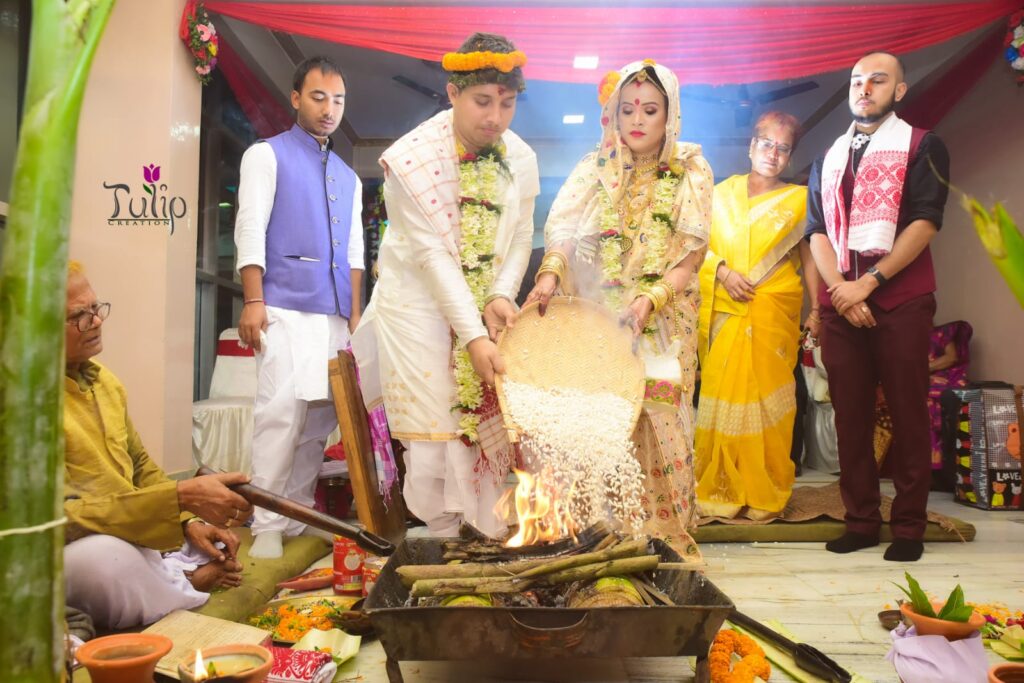 bride and groom performing wedding rituals